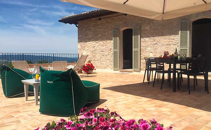 The large terrace of Assisi al Quattro holiday home in historic centre of Assisi, Umbria, Italy