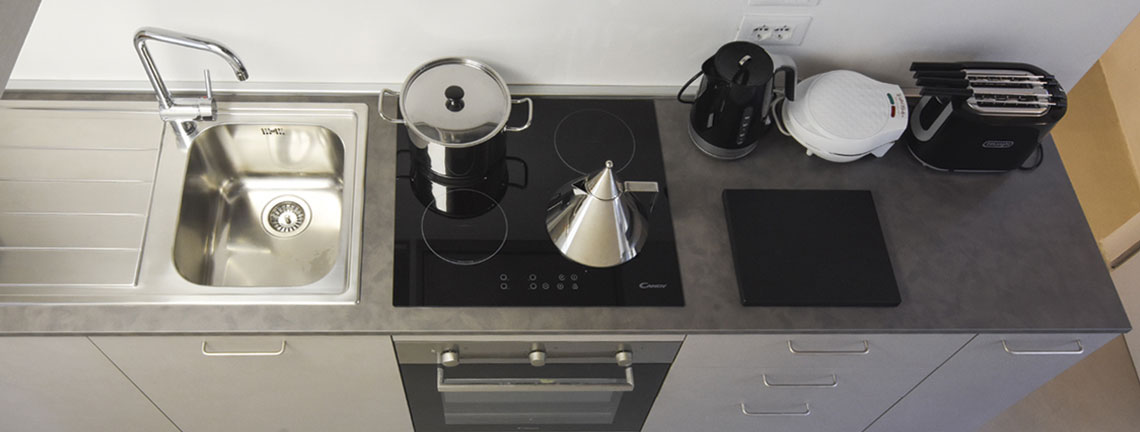 The equipped kitchen area of Assisi al Quattro holiday residence in historic centre of Assisi, Umbria, Italy